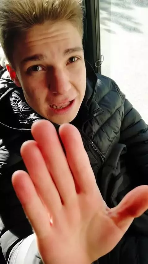 AI Video from prompt: First, this man begs for money, and then he kiss