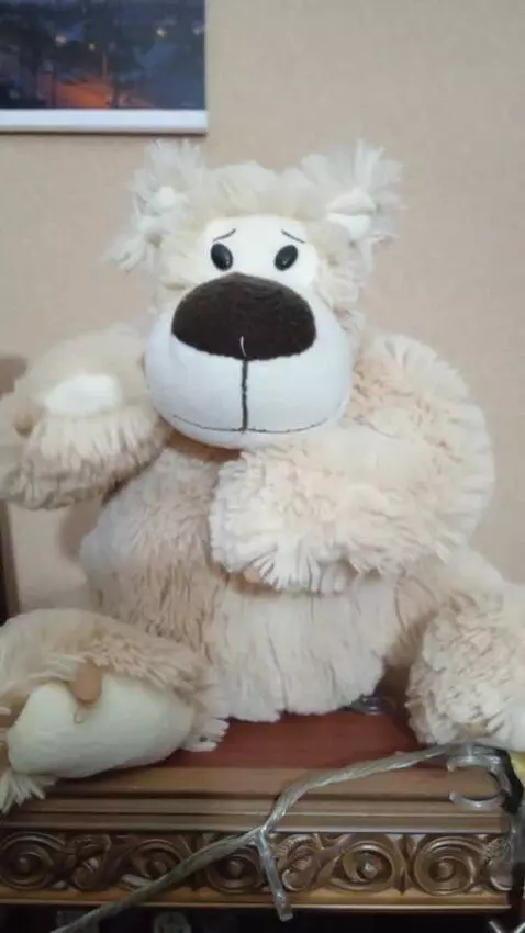 AI Video from prompt: waves its paws and dances