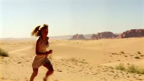 AI Video from prompt: A beautiful girl runs through the desert, and th