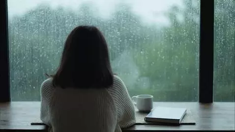 AI Video from prompt: create a video loop 8-10 seconds of a girl sitti