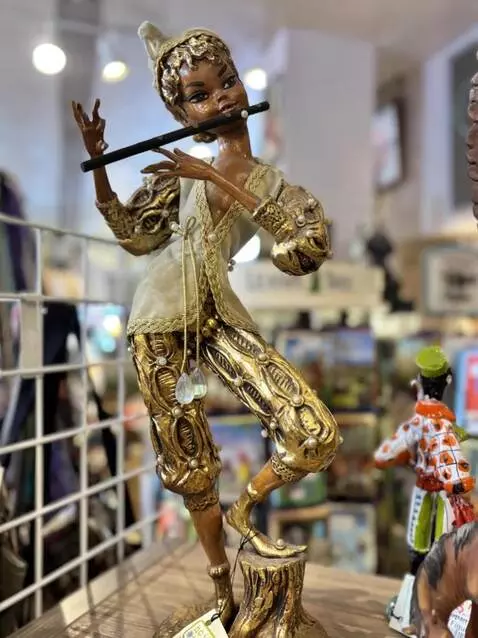 AI Video from prompt: Make come alive and playing the flute