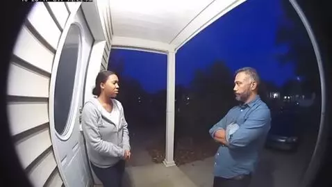 AI Video from prompt: {   "style": "Ring doorbell camera aesthetic: wi