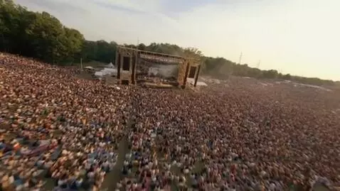 AI Video from prompt: 1969. Woodstock Music & Art Fair Festival. A vie