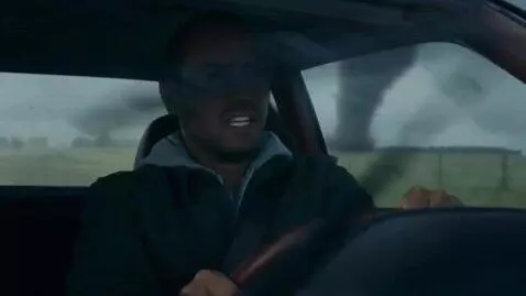 AI Video from prompt: Man inside the car is fleeing a tornado, audio i