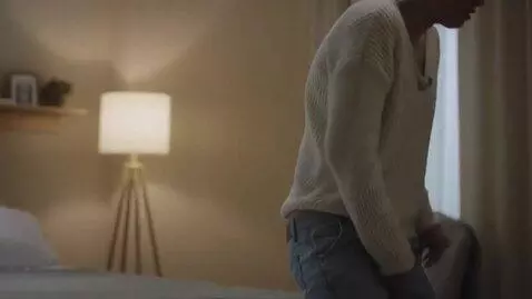 AI Video from prompt: She gets up with cancer and takes off her jeans