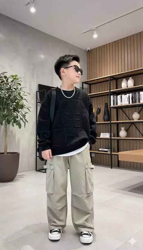 AI Video from prompt: The boy, with a slight smile, turns his head to 