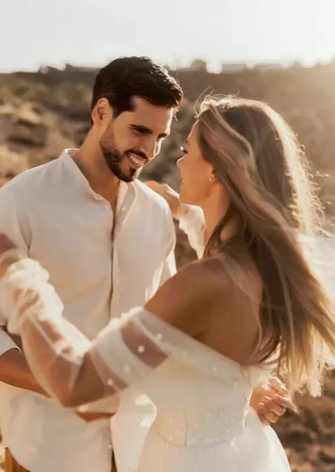 AI Video from prompt: A girl and a boy run towards each other in the w