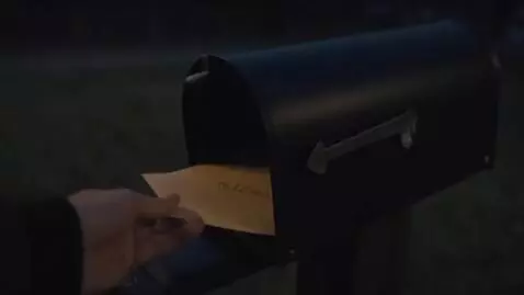 AI Video from prompt: “A young couple moving into an old two-story hou