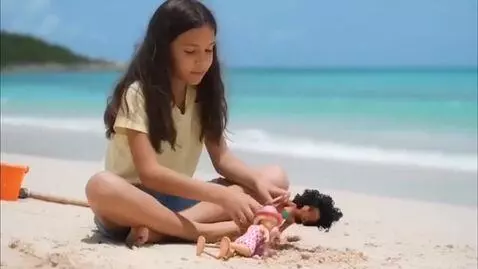AI Video from prompt: She plays with dolls on the beach in russian