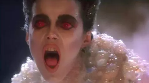 AI Video from prompt: Looking at viewer mouth wide open sticking out t