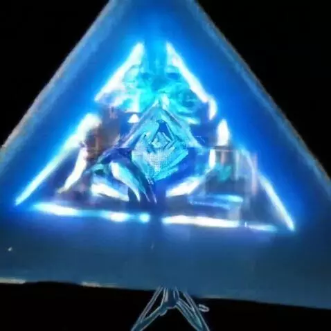 AI Video from prompt: A glowing Bluish pyramid placed in the center of