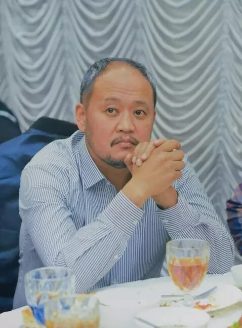 AI Video from prompt: He looks at the camera and waves and says goodby