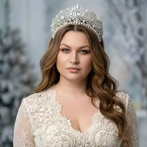 AI Video from prompt: The woman starts to turn towards the camera and 