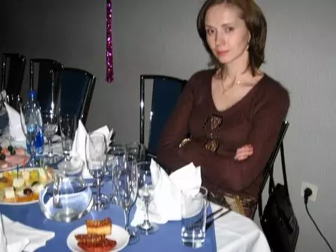 AI Video from prompt: The woman in the photograph is wearing a miniski