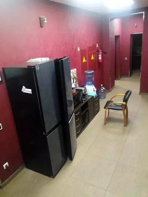 AI Video from prompt: A scary old man emerges from the dark refrigerat