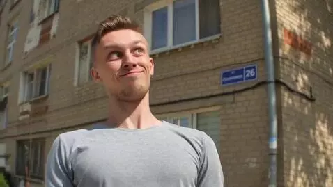 AI Video from prompt: The actor in the photo starts doing a backflip, 