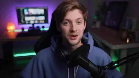 AI Video from prompt: The scene takes place in a streamer's room. A yo