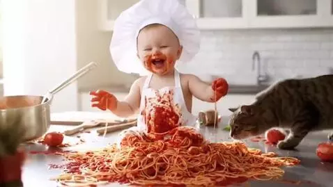 AI Video from prompt: Subject: A baby in a giant chef’s hat and oversi