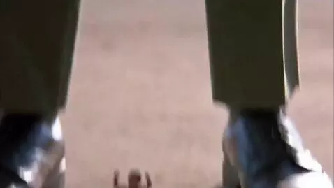 AI Video from prompt: A low angle shot of a military man, wearing an u