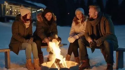 AI Video from prompt: on the benches by the fire, a cozy atmosphere. g