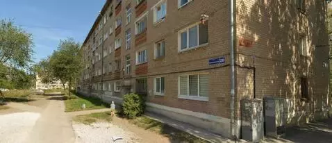 AI Video from prompt: A cheerful thug in a tracksuit and cap appears i