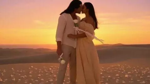 AI Video from prompt: The woman whirls before a strong man, their lips