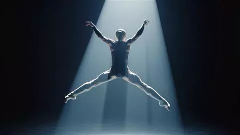 AI Video from prompt: A 5-second cinematic dance clip. A single, harsh