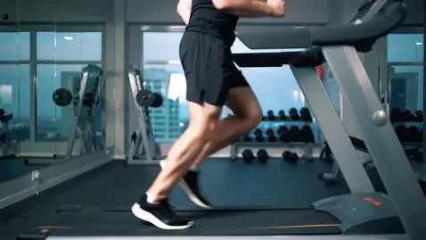 AI Video from prompt: Generate a person running on a treadmill