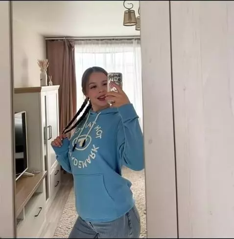 AI Video from prompt: showing her boobs