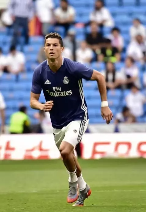 AI Video from prompt: Create video cristiano Ronaldo run and kick foot