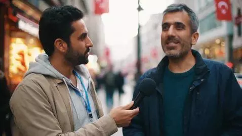 AI Video from prompt: A street interview scene in Istanbul. A male rep