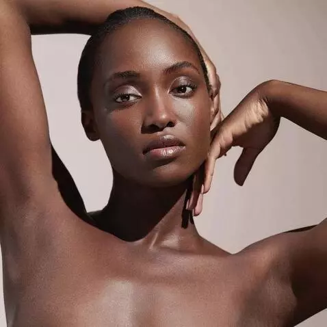 AI Video from prompt: A serene Black woman with closed eyes and radian