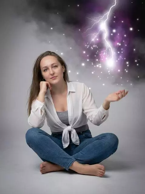 AI Video from prompt: The girl lowers her hand and loosely puts it on 