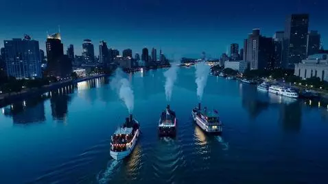 AI Video from prompt: Cinematic style. A city at night. A wide river. 