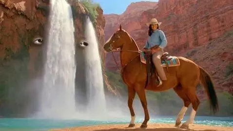 AI Video from prompt: A multiracial cowgirl  riding on dancing horse a