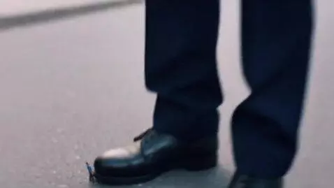 AI Video from prompt: The camera shows a man is walking and bumping ag