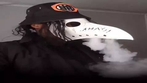 AI Video from prompt: White smoke passes through the holes in the bott