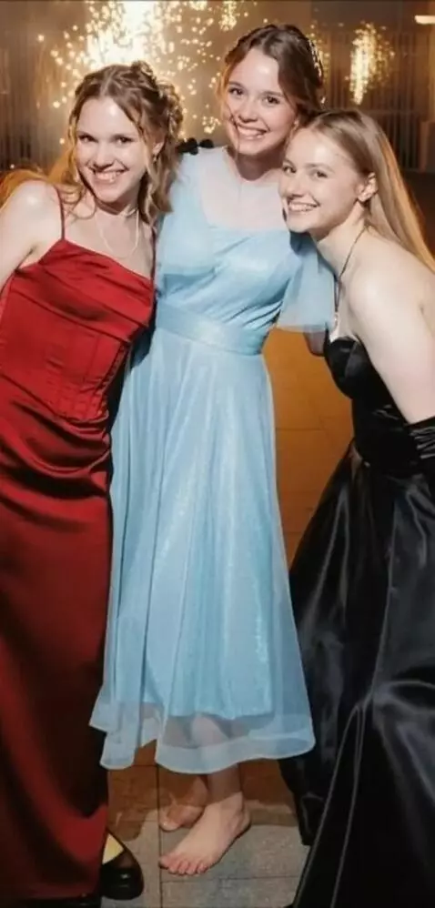 AI Video from prompt: The bare feet of central girl should be tickled 