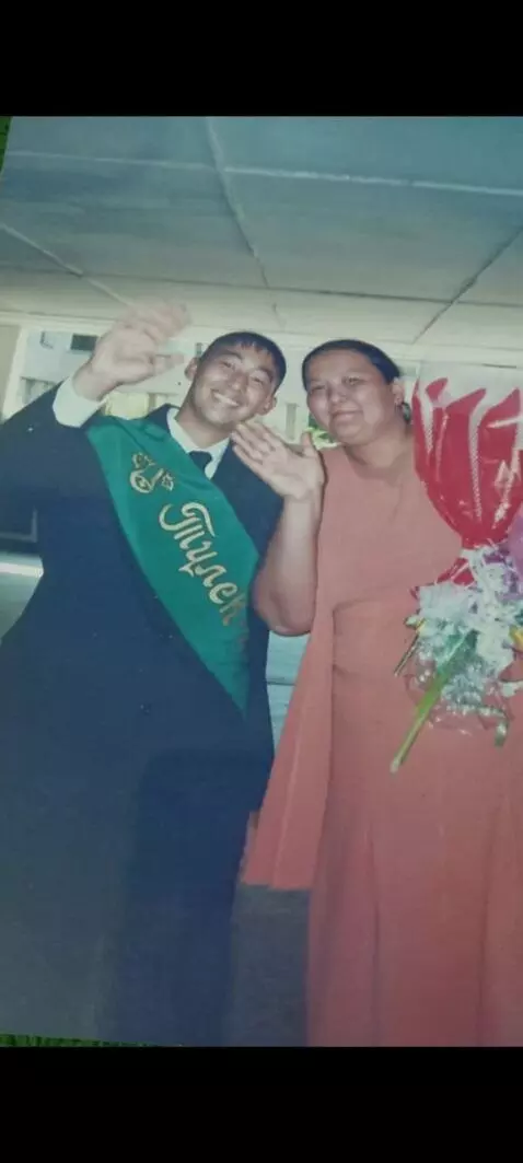 AI Video from prompt: they look at the camera and wave their hands let