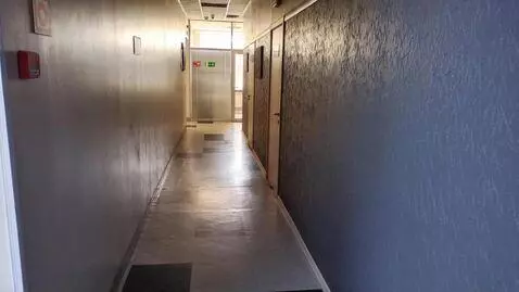 AI Video from prompt: in the hallway, a ghost appears from the first d