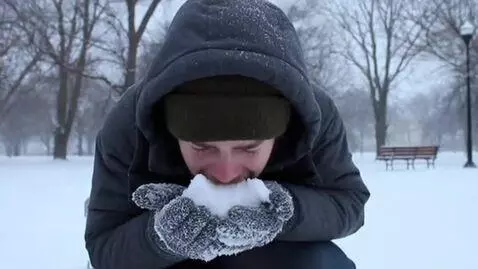 AI Video from prompt: a guy goes eats the snow, he's sad