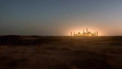 AI Video from prompt: A distant golden light resembling the shrine of 