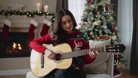 AI Video from prompt: A woman with long brown hair dressed in a red wo