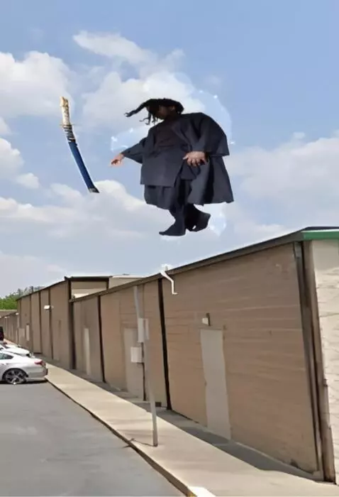 AI Video from prompt: Maintaining the same pose, the man and the objec