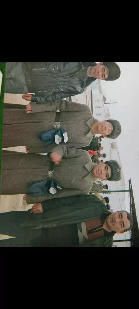 AI Video from prompt: They look at the camera and smile, wave their ha