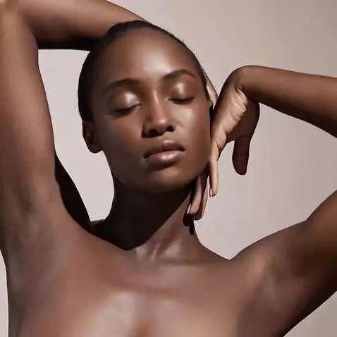 AI Video from prompt: A serene Black woman with radiant skin, eyes clo