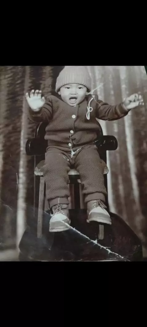 AI Video from prompt: Make him look more alive and when he awkwardly w