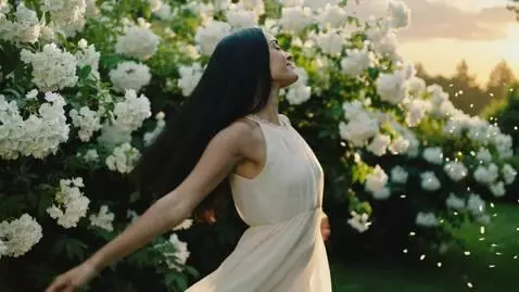 AI Video from prompt: A beautiful woman with long black hair dances an