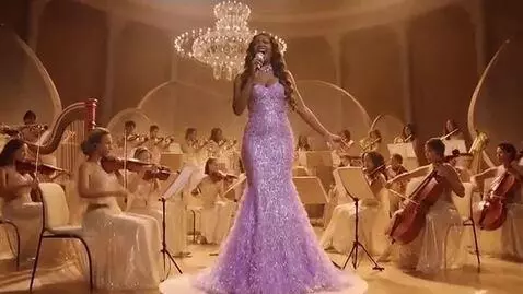 AI Video from prompt: An all female orchestra dressed in golden crysta