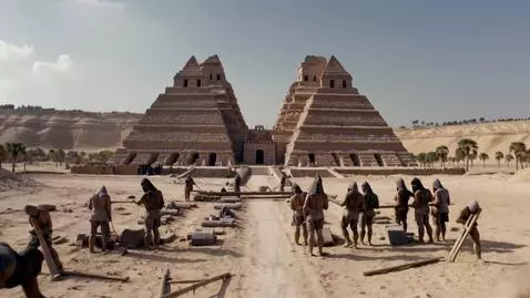 AI Video from prompt: Giants building the pyramids of Egypt